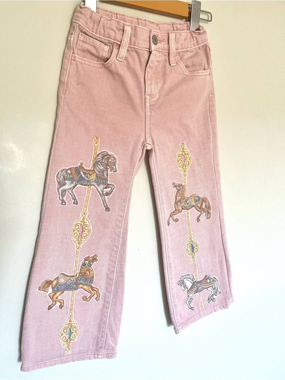 Girls jeans with added carousel horses patches size 6